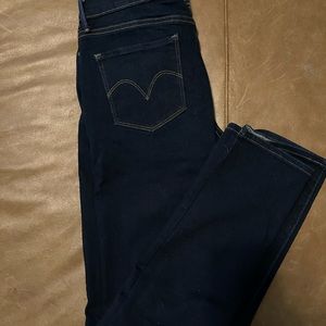 Levi’s mid rise skinny jeans.